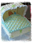 baby in a crib cake