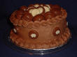 Simple cake with chocolate candies decorating the top